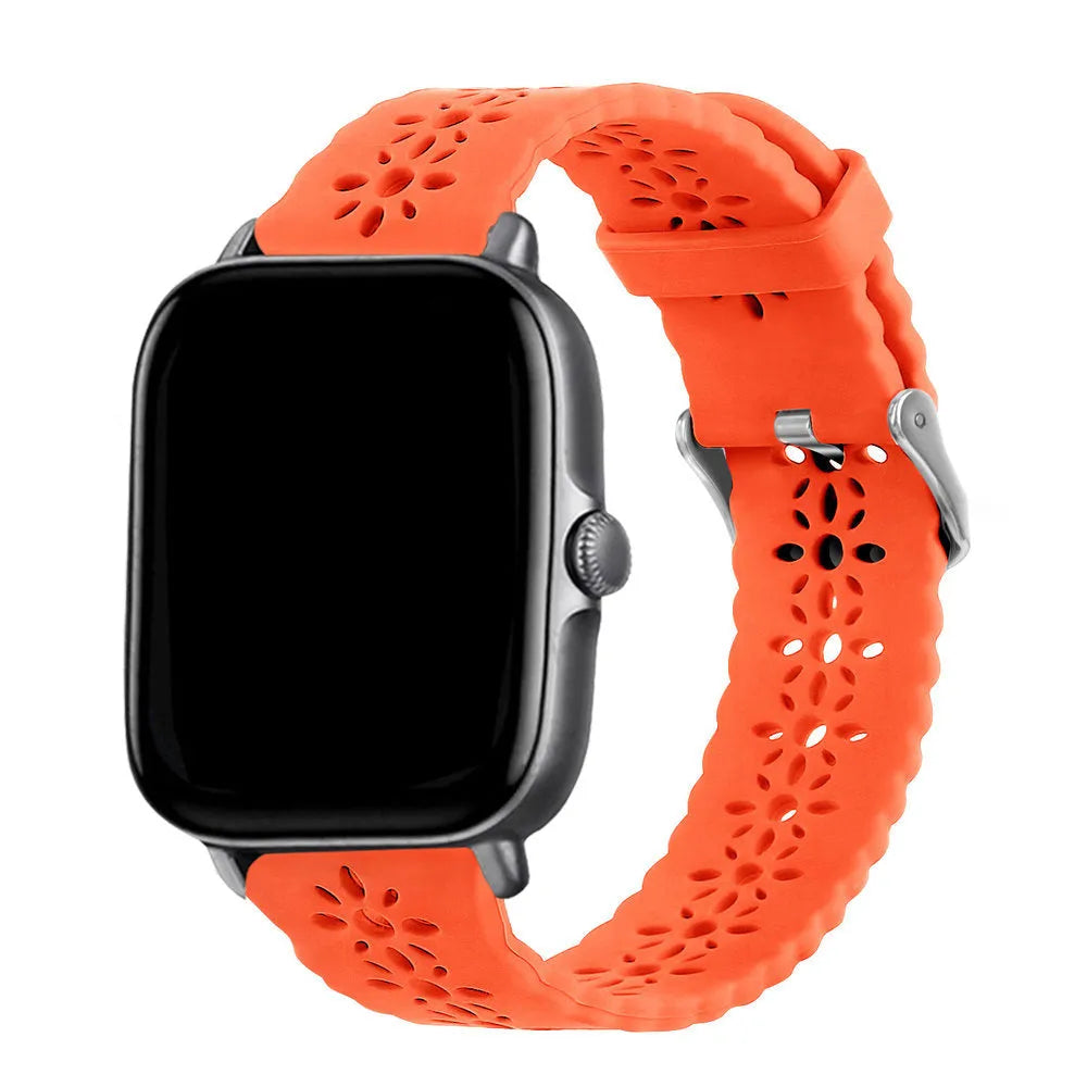 Patterned Silicone Strap, orange, on a watch, 3/4 front view