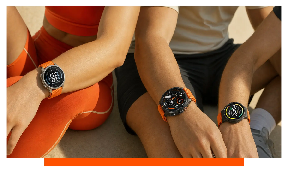 Three smartwatches worn on separate wrists, worn, mid-workout - Garmin Fenix 9 and Samsung Galaxy Watch Ultra 2 and Suunto Vertical 2