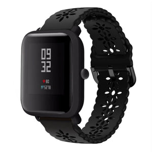 Patterned Silicone Strap, black, on a watch, 3/4 front view