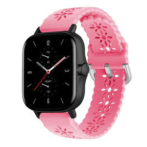Patterned Silicone Strap, bright pink, on a watch, 3/4 front view