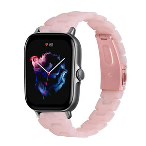 Metal Resin Strap, pink, on a watch, 3/4 front view