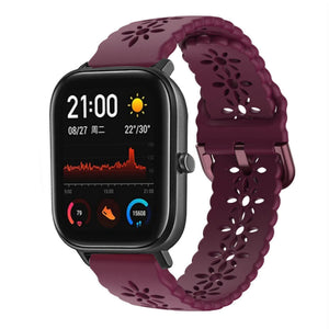 Patterned Silicone Strap, burgundy, on a watch, 3/4 front view