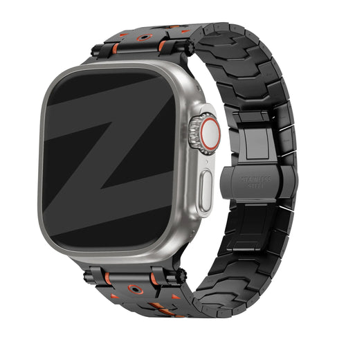 Metal Grain Strap 'Deluxe', black/orange, on a watch, 3/4 front view