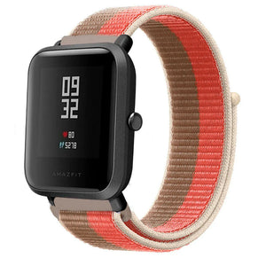 Nylon Strap, pink pomelo, on a watch, 3/4 front view