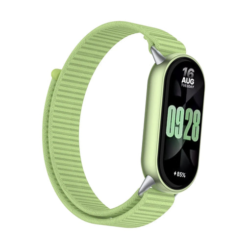 Modern Nylon Strap, field green, on a watch, 3/4 front view