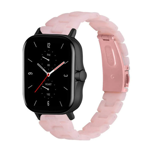 Metal Resin Strap, pink, on a watch, 3/4 front view