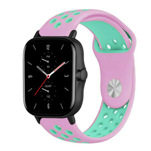 Silicone Sport Strap, pink/aqua, on a watch, 3/4 front view