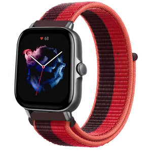 Nylon Strap, cherry magenta, on a watch, 3/4 front view