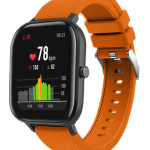 Twill Silicone Strap, orange, on a watch, 3/4 front view