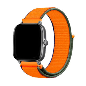 Nylon Strap, kumquat, on a watch, 3/4 front view
