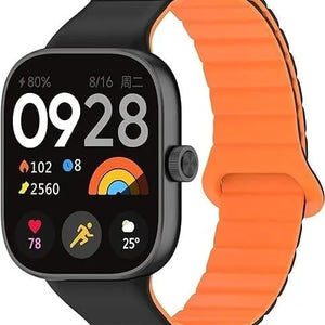 Magnetic Silicone Strap, black/orange, on a watch, 3/4 front view