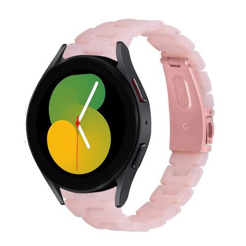 Metal Resin Strap, pink, on a watch, 3/4 front view