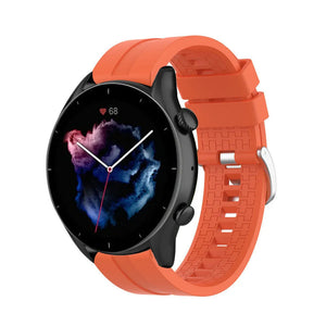 Silicone Strap 'Extreme', orange, on a watch, 3/4 front view