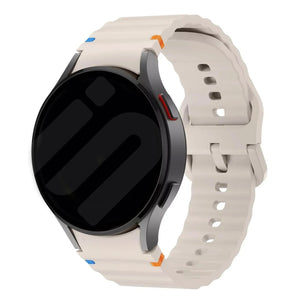 Wave Silicone Strap, starlight, on a watch, 3/4 front view