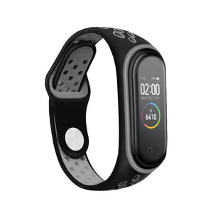 Silicone Sport Strap, black/grey, on a watch, 3/4 front view