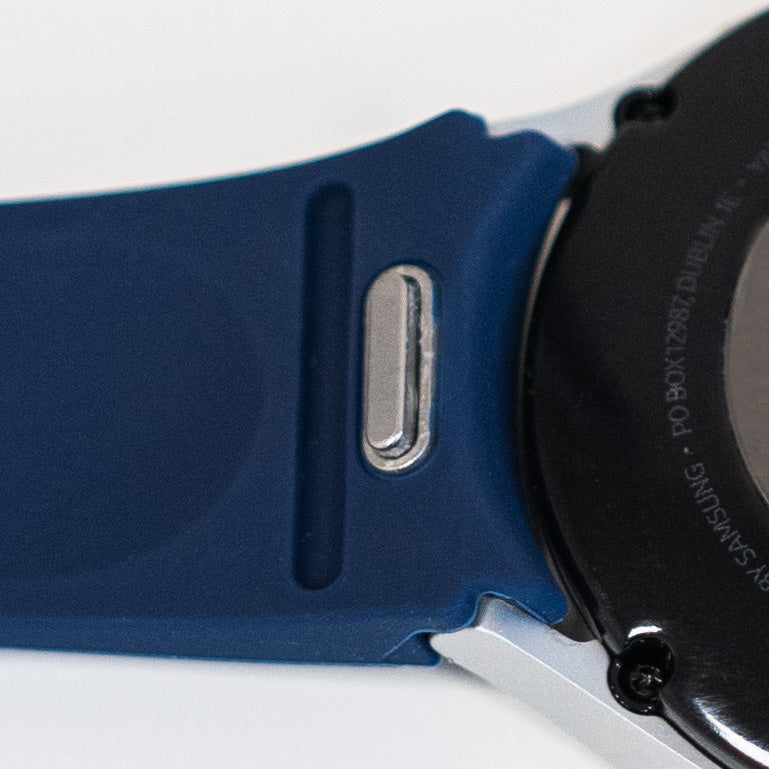 Silicone Strap 'One Push', dark blue, on a watch, 3/4 rear view