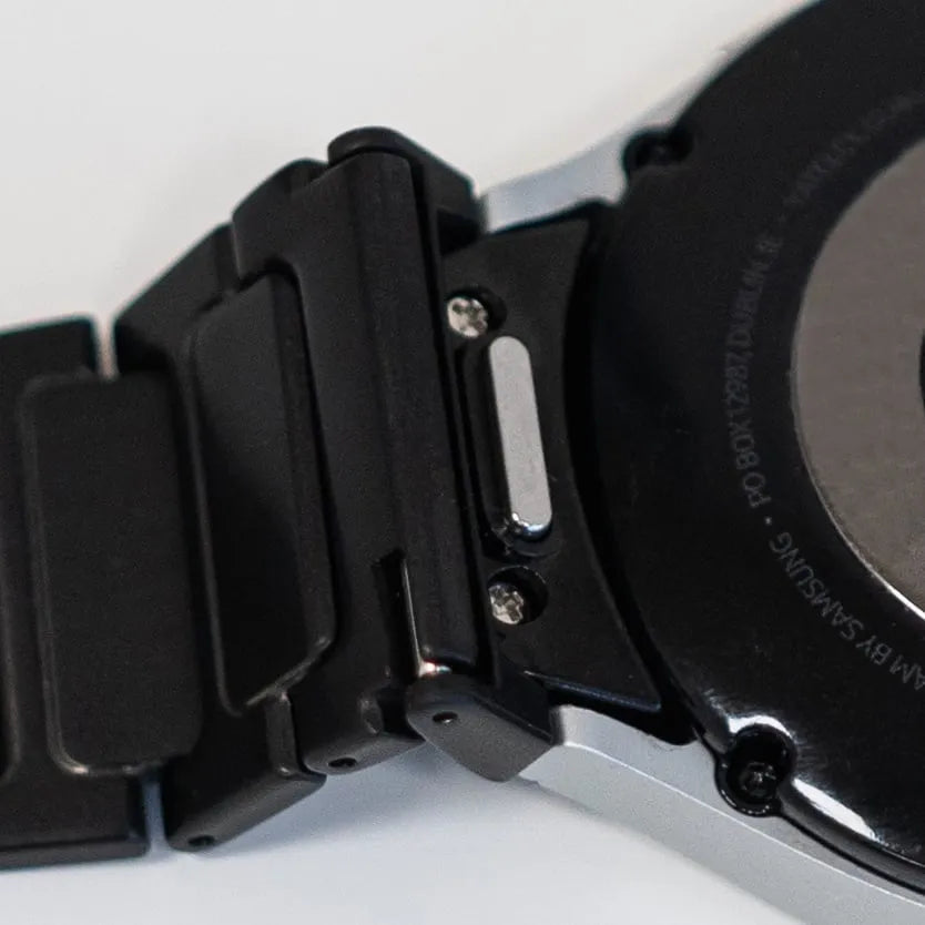 Titanium Strap 'One Push', black, on a watch, 3/4 rear view