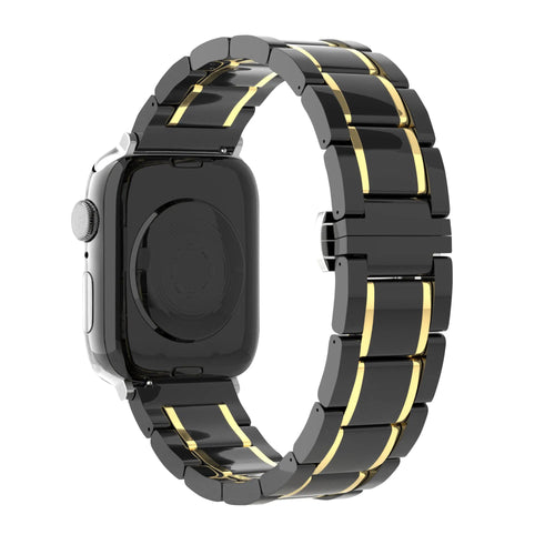 Metal Ceramic Link Strap, black/gold, on a watch, 3/4 rear view