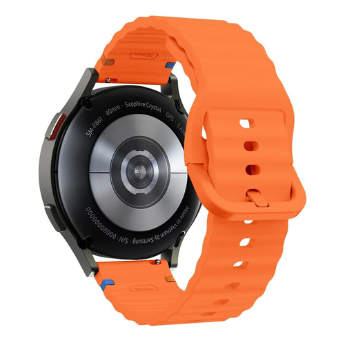 Wave Silicone Strap, orange, on a watch, 3/4 rear view