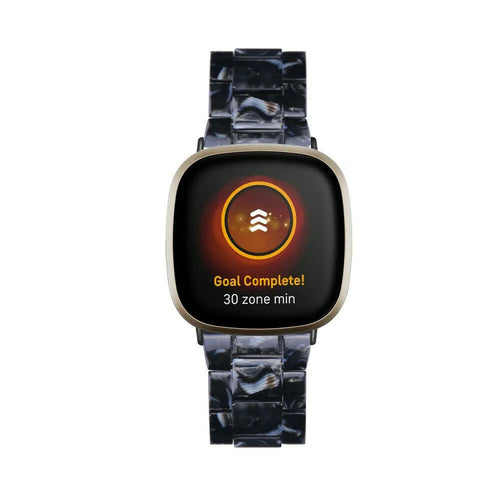 Metal Resin Strap, black/white, on a watch, direct front view
