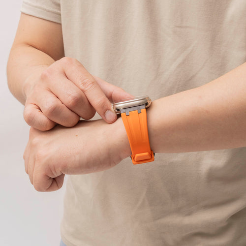 Silicone Strap 'Luxe Liquid', orange/black, lifestyle photo