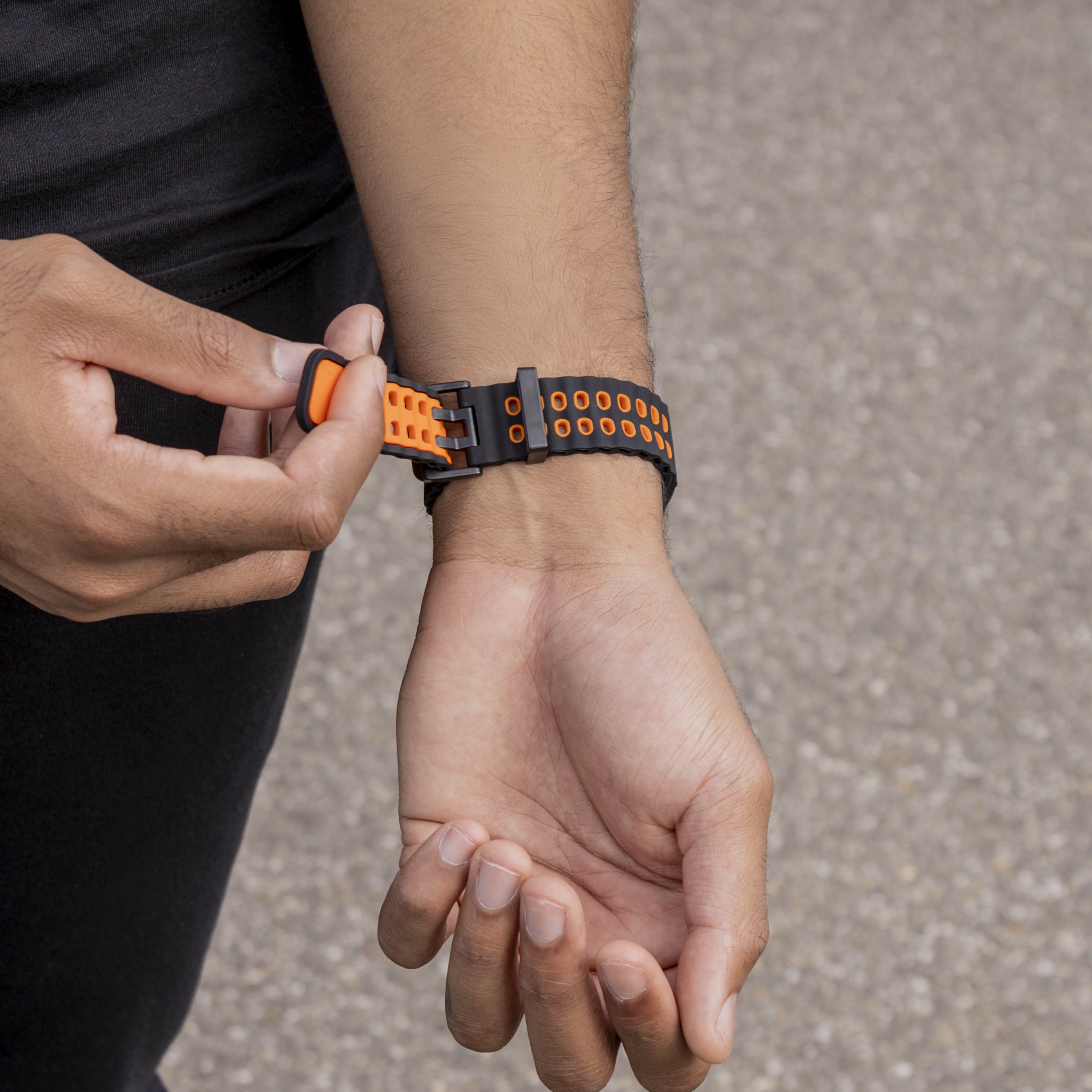 Silicone Ocean Strap, black/orange, lifestyle photo