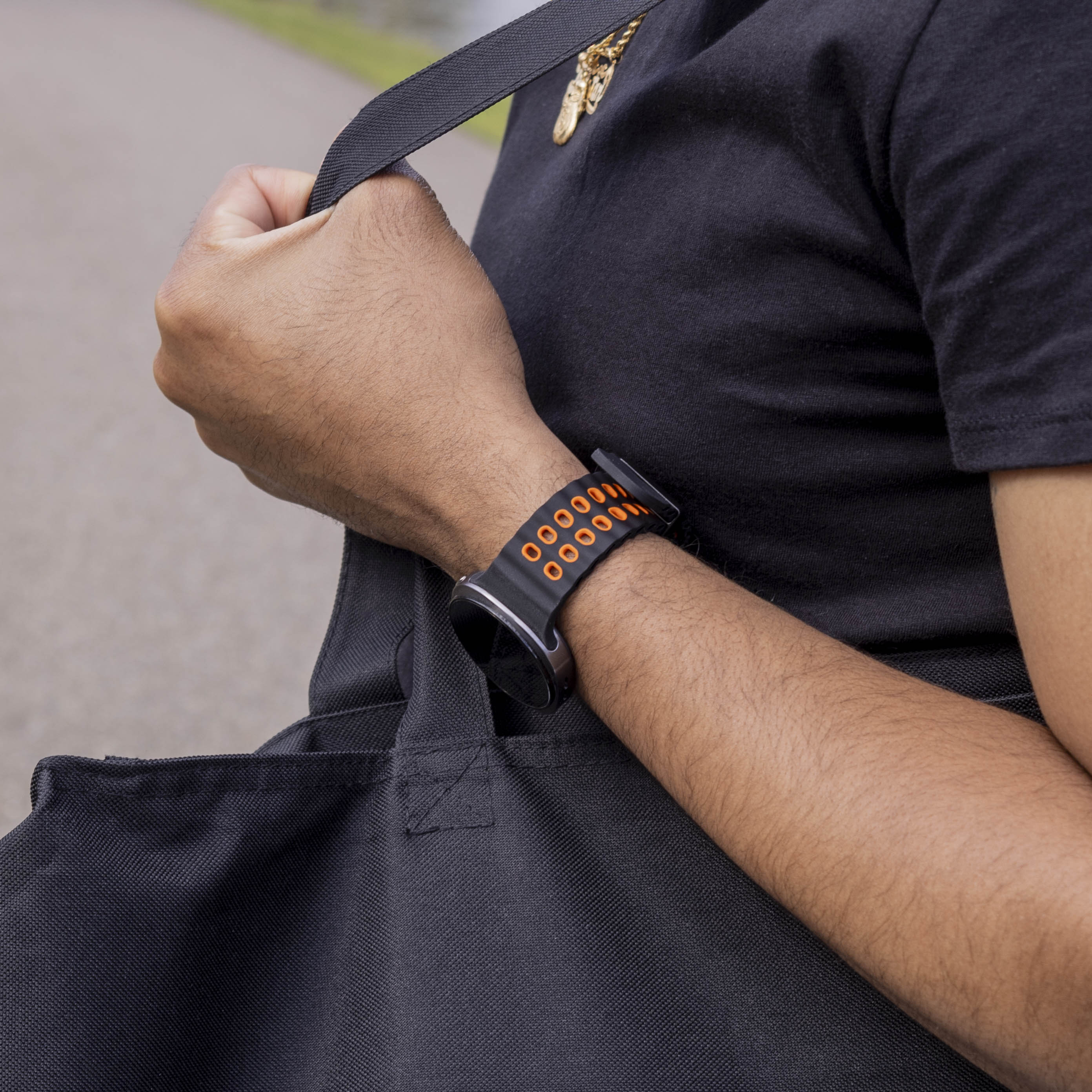 Silicone Ocean Strap, black/orange, lifestyle photo