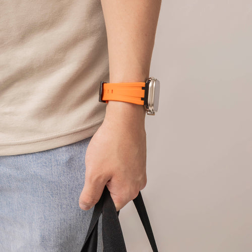 Luxury Liquid Silicone Strap, orange/black, lifestyle photo